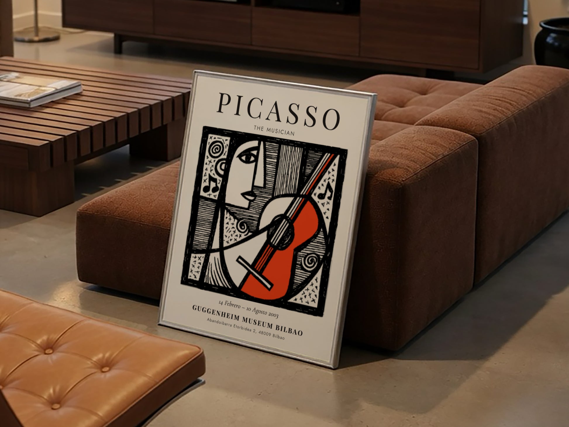 Picasso inspired poster featuring a musician with guitar in monochrome style