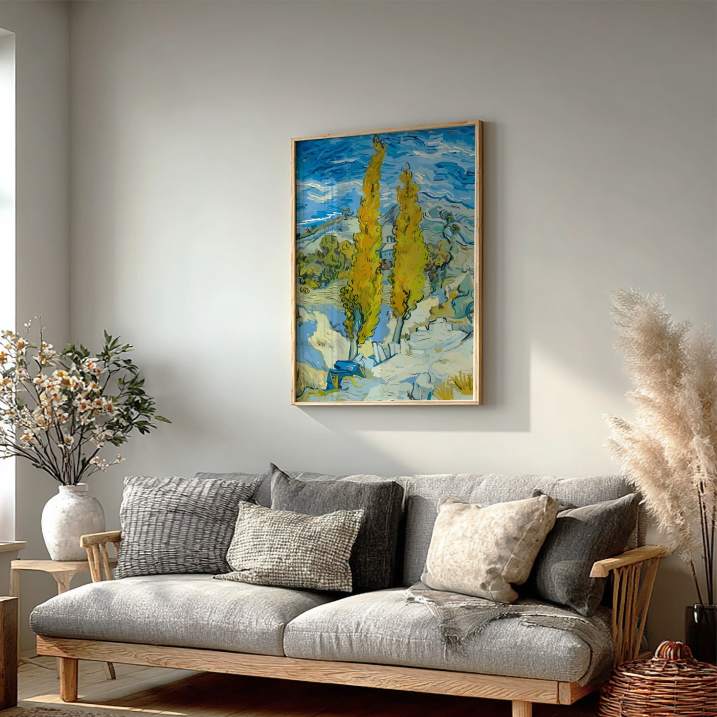 Vincent Van Gogh's "The Poplars" art poster, featuring tall yellow trees and a blue sky.