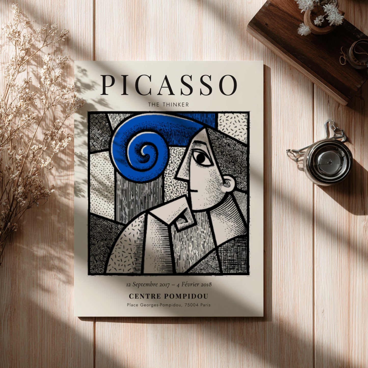 Picasso inspired poster featuring The Thinker with bold lines and swirling colors, perfect for wall decor.