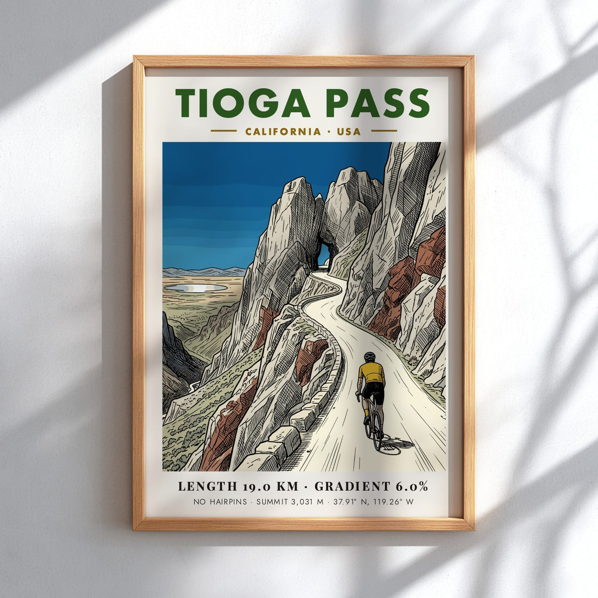 Poster of a cyclist climbing Tioga Pass with rocky mountains and blue sky.