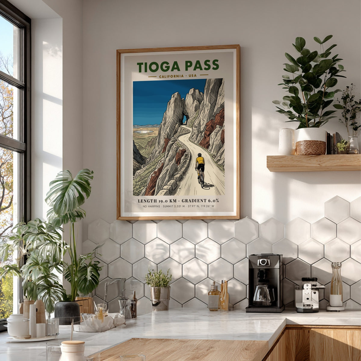 Poster of a cyclist climbing Tioga Pass with rocky mountains and blue sky.