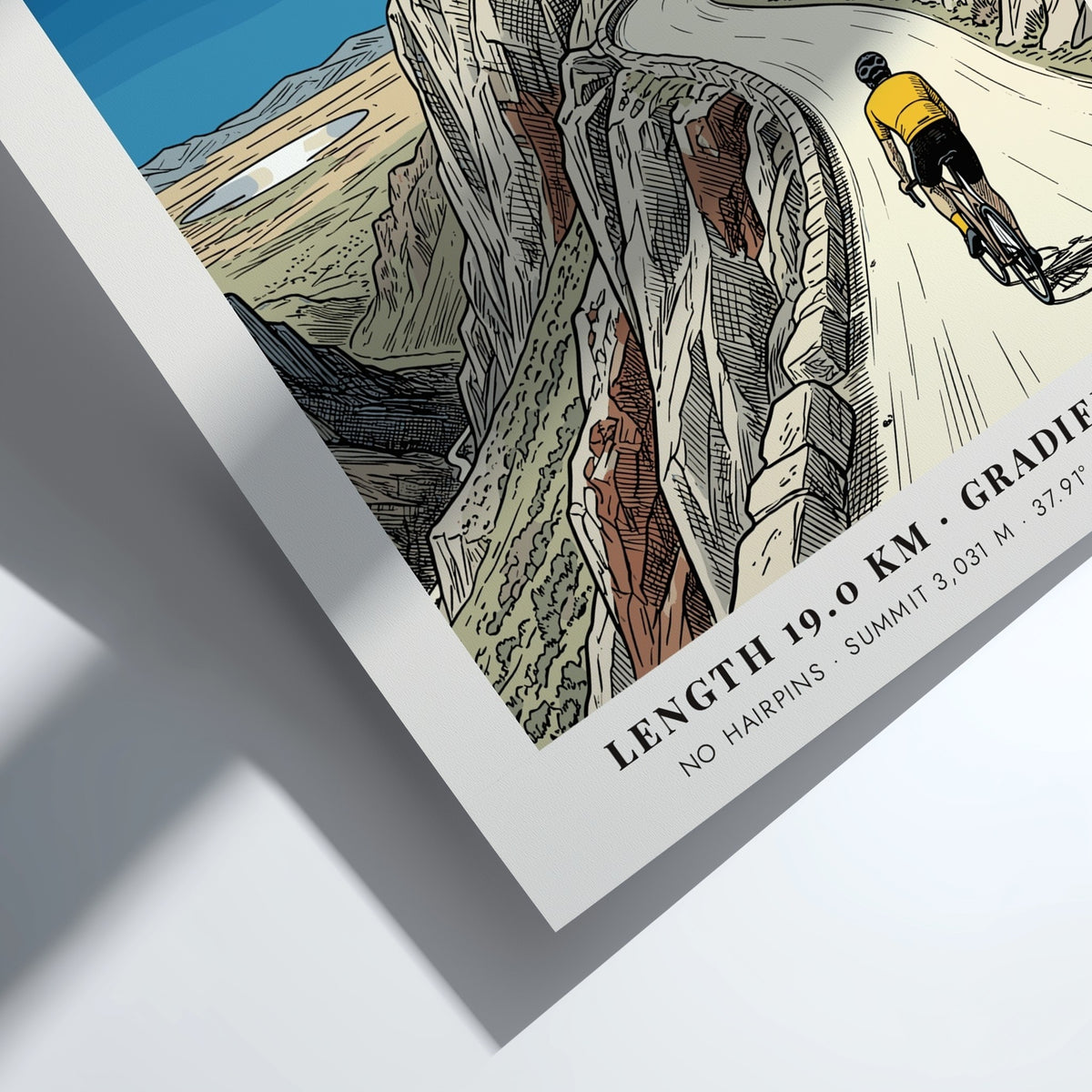 Poster of a cyclist climbing Tioga Pass with rocky mountains and blue sky.