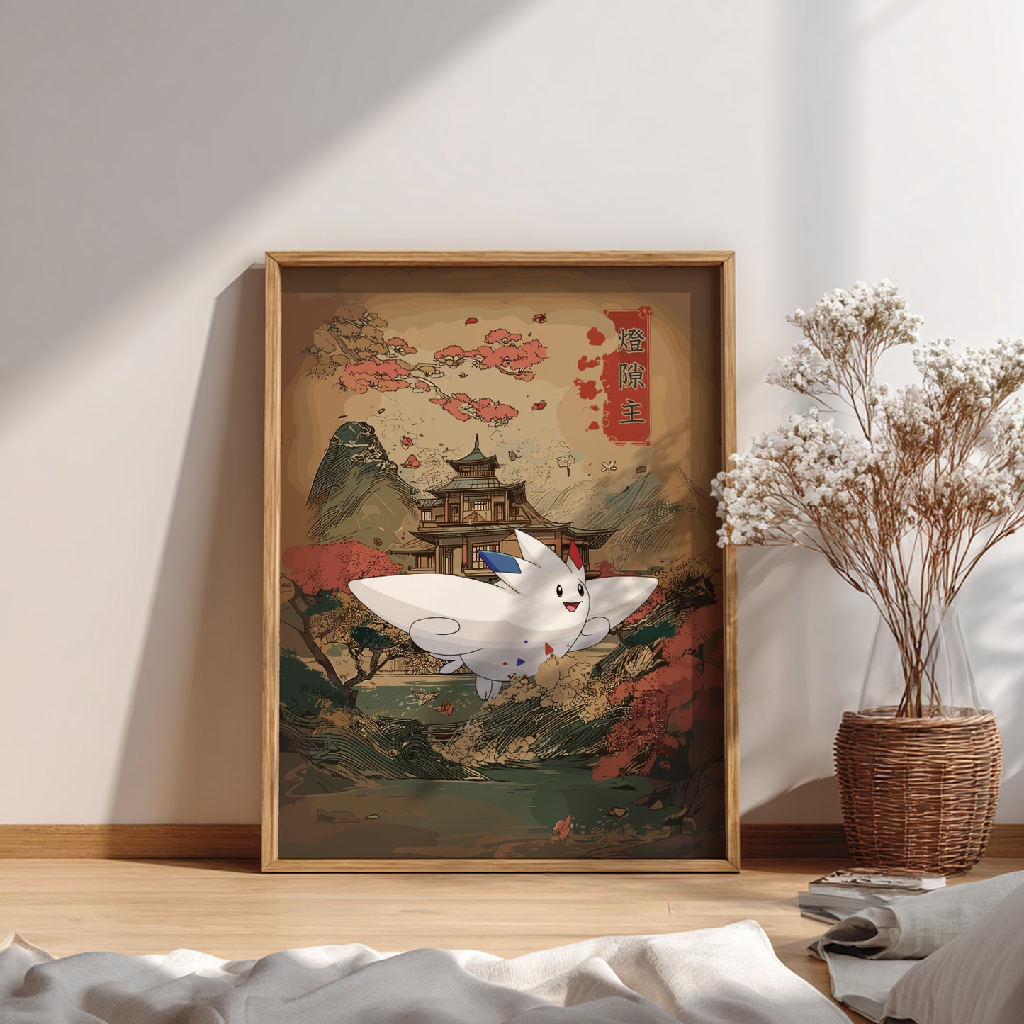 Framed artwork with Togekiss Pokemon on a wall next to a plant