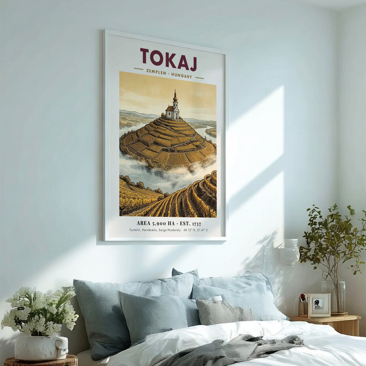 Poster of Tokaj Hungary featuring a hilltop church amidst golden terraced vineyards landscape.