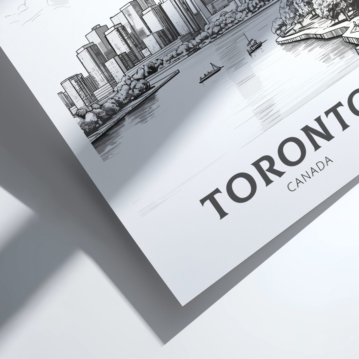 Framed artwork of Toronto skyline with 'Toronto Canada' text