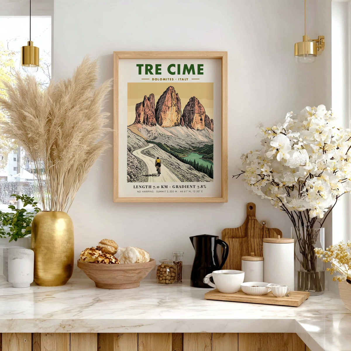 Poster of a lone cyclist riding through the jagged Tre Cime mountain peaks.