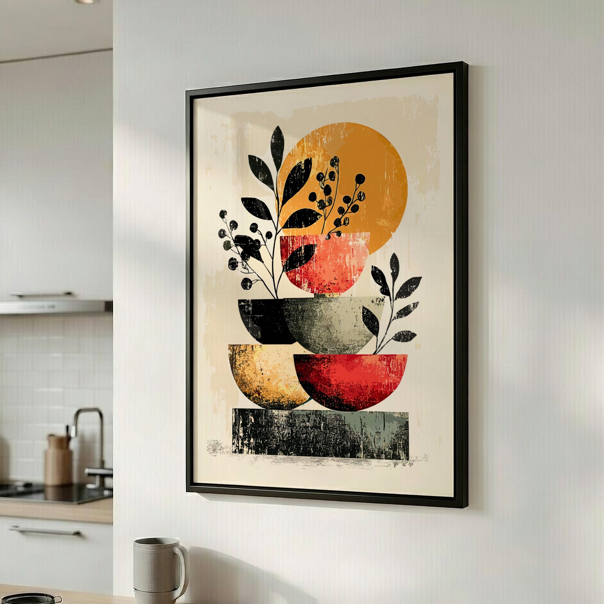 Framed abstract art print with colorful bowls and leaves in a kitchen setting
