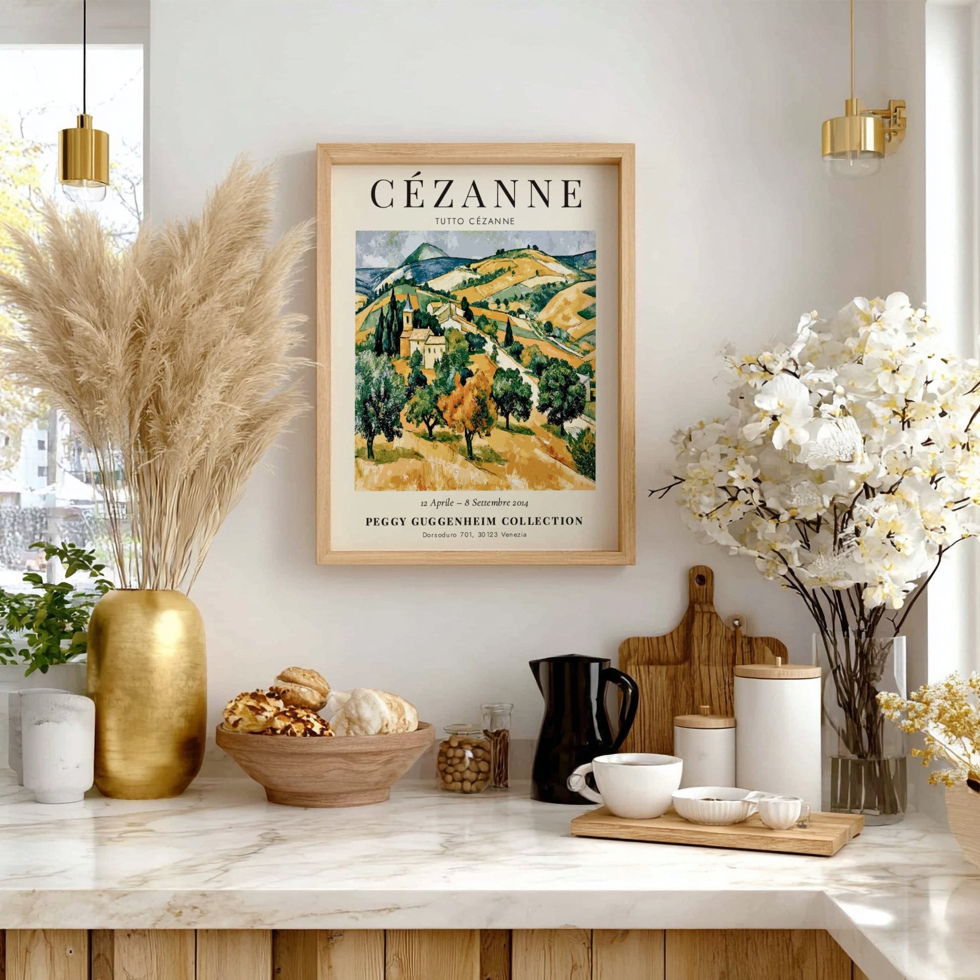 Cézanne exhibition poster featuring a vibrant landscape in green and gold tones