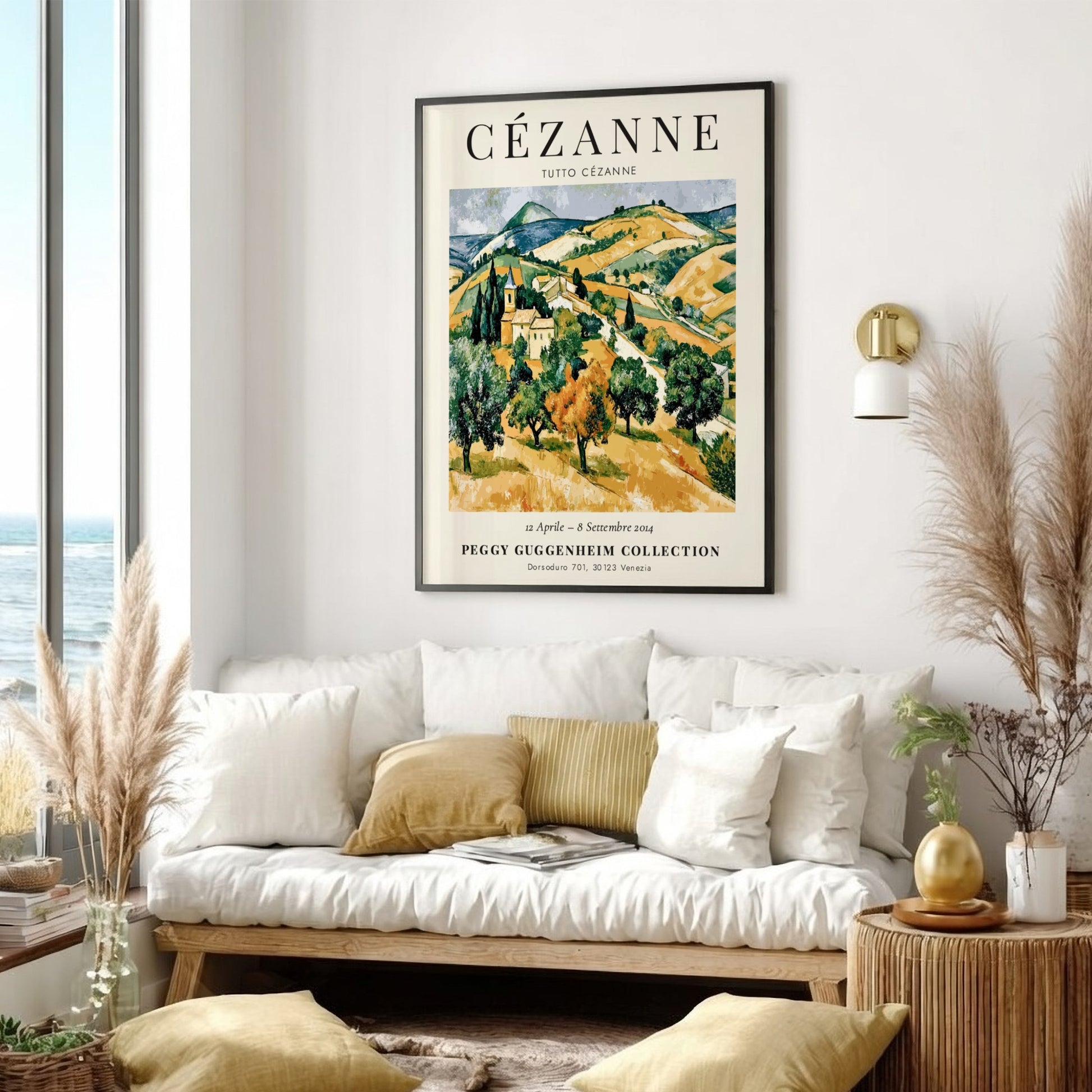Cézanne exhibition poster featuring a vibrant landscape in green and gold tones