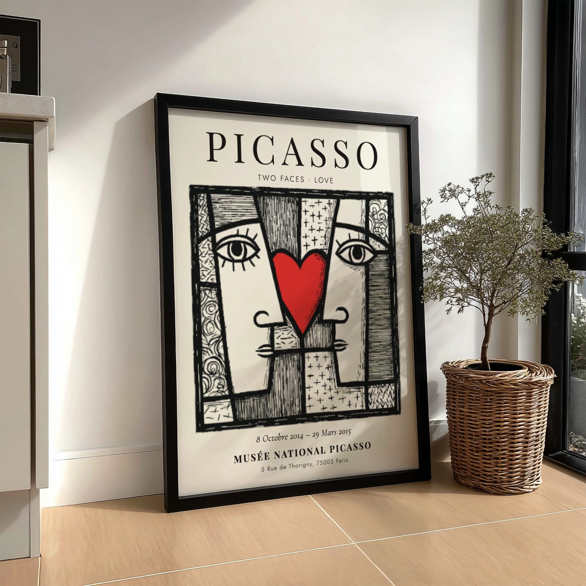 Picasso inspired poster featuring two abstract faces and a red heart, perfect for modern wall decor.