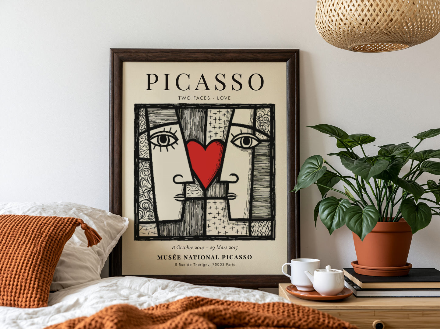 Picasso inspired poster featuring two abstract faces and a red heart, perfect for modern wall decor.