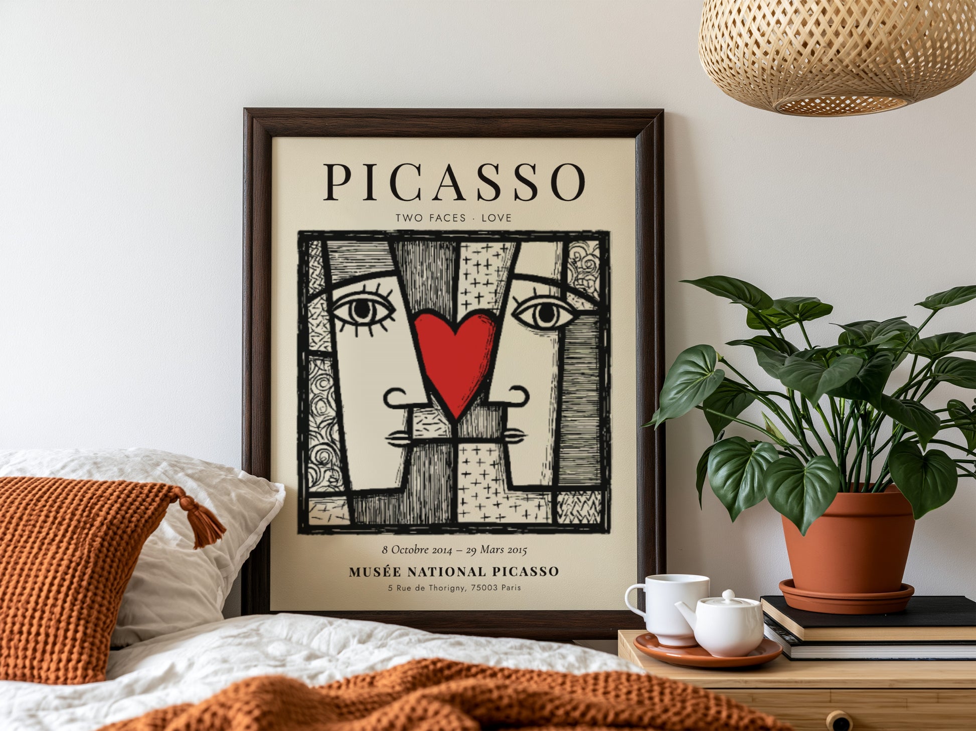 Picasso inspired poster featuring two abstract faces and a red heart, perfect for modern wall decor.