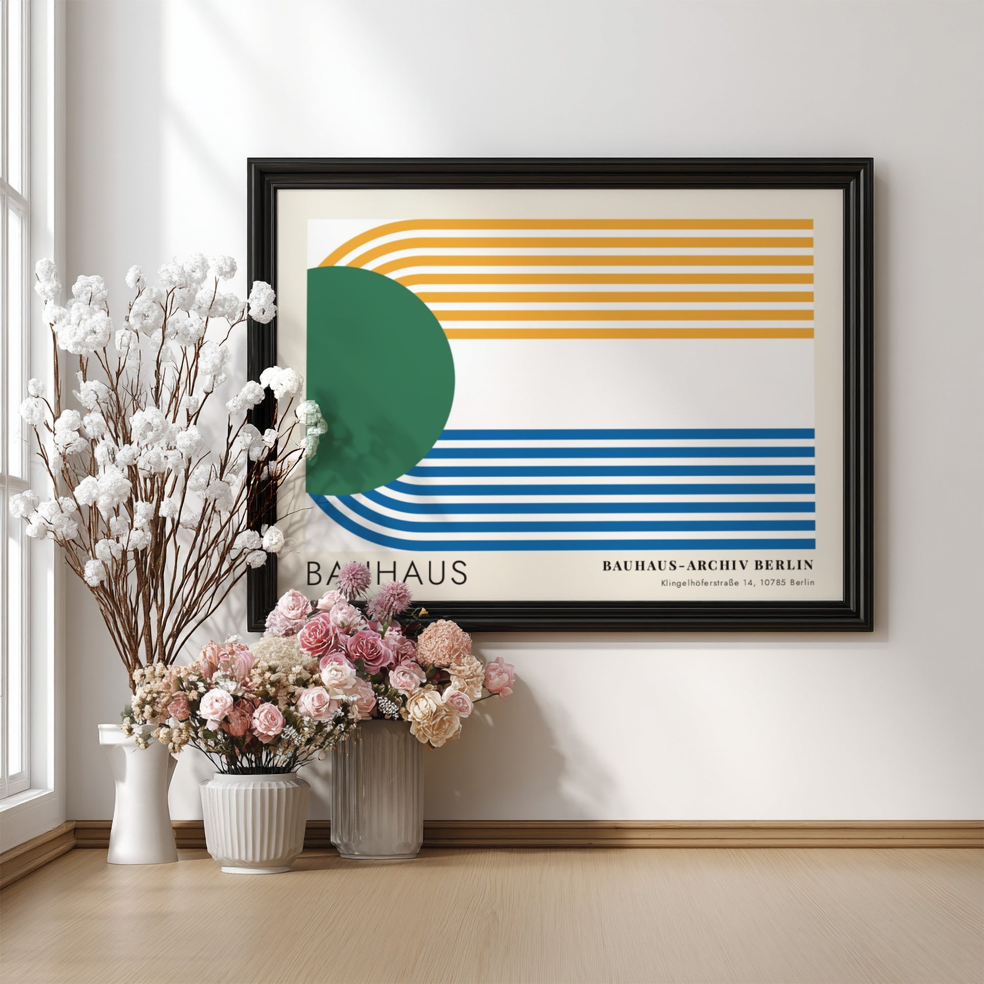 Wall art poster featuring a green circle and blue and yellow parallel lines.