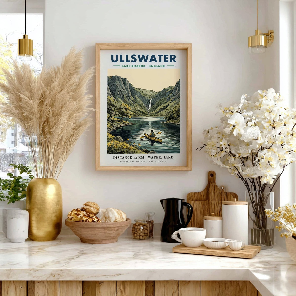 Travel poster of Ullswater featuring a kayaker on a lake beneath green mountains.