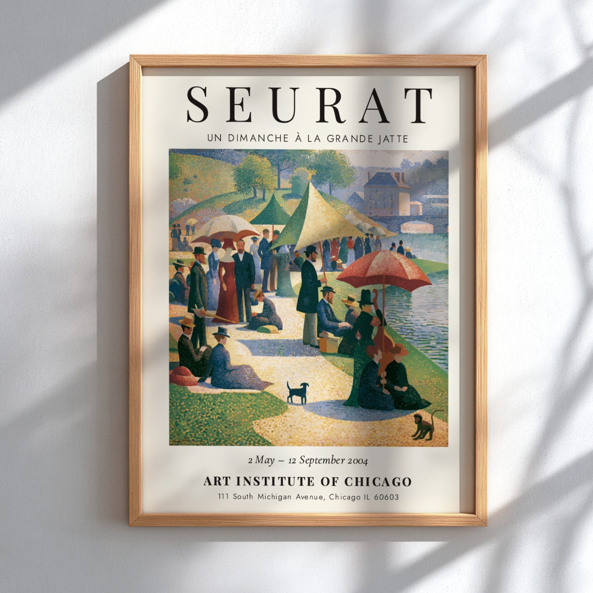 Seurat exhibition poster featuring Un Dimanche à la Grande Jatte with vibrant colors and serene picnic scene