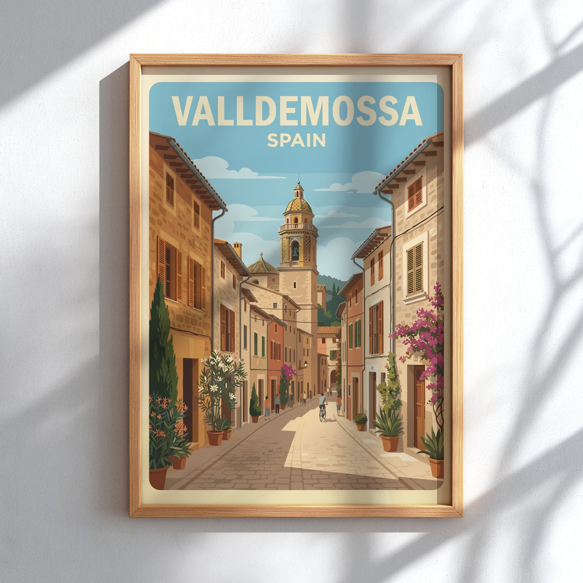 Poster of Valldemossa Spain showing a cobblestone street, stone buildings, and church tower.
