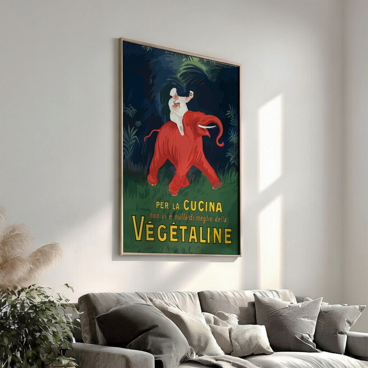 Vintage Vegetaline poster by Leonetto Cappiello featuring a chef on a red elephant. Art Nouveau style.