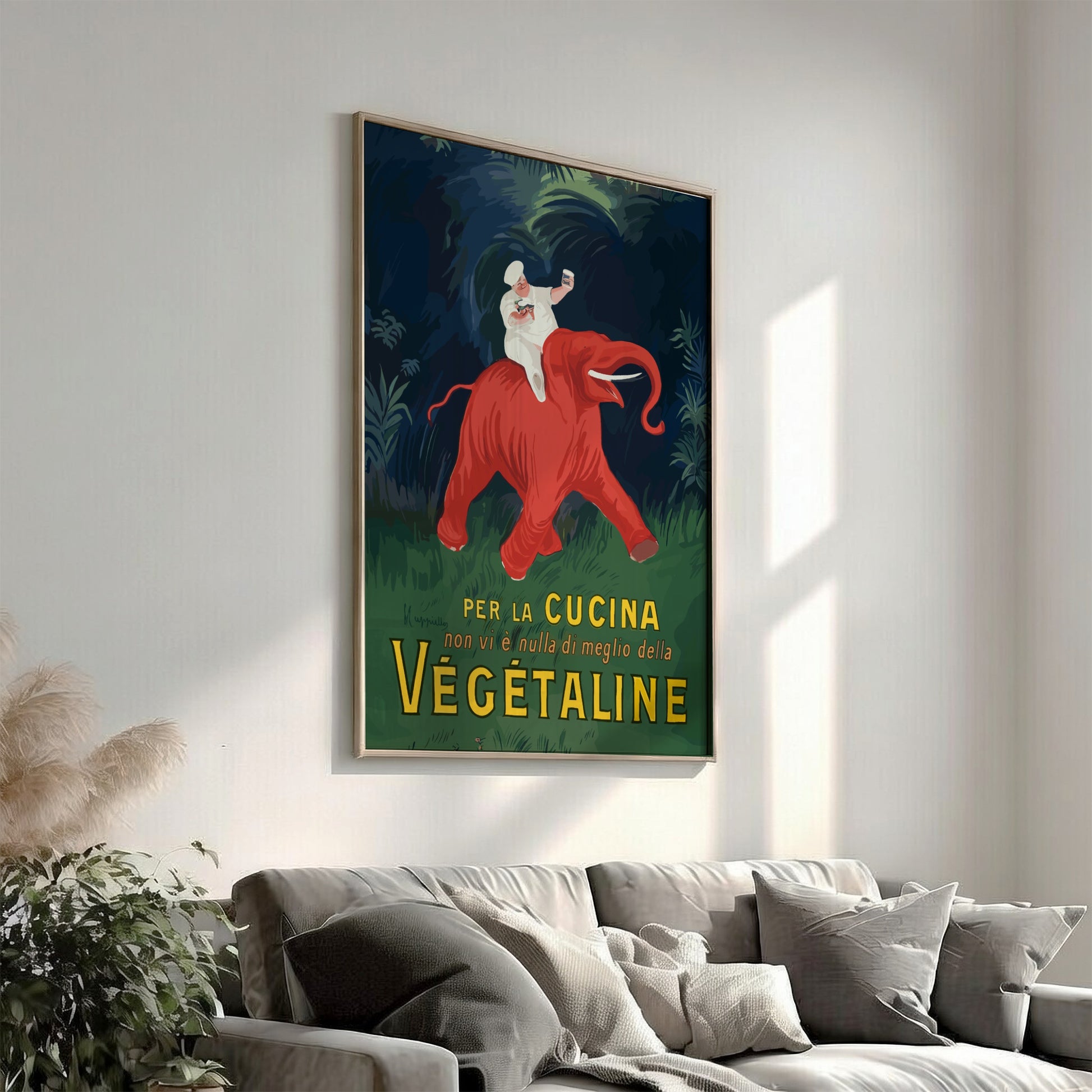 Vintage Vegetaline poster by Leonetto Cappiello featuring a chef on a red elephant. Art Nouveau style.