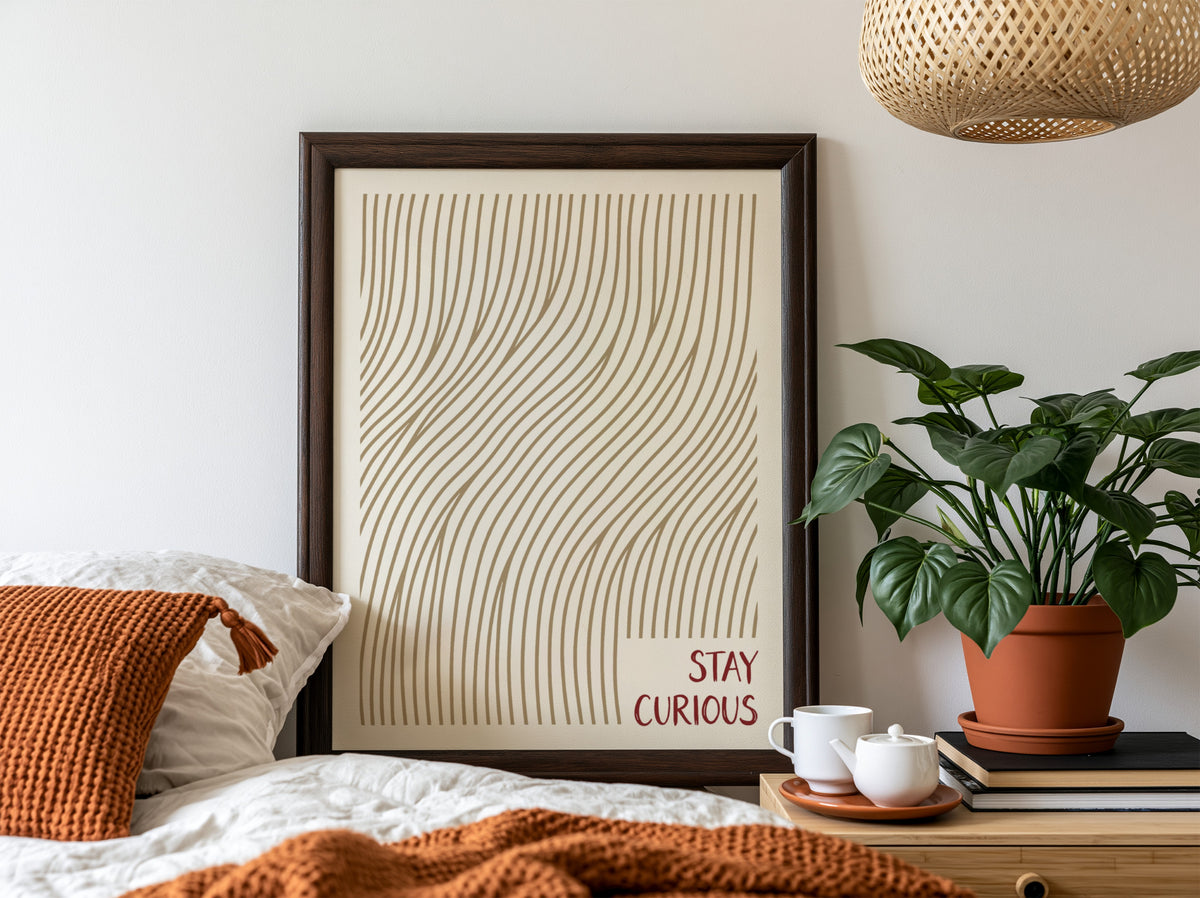 Motivational poster with golden wavy lines and the text Stay Curious in red