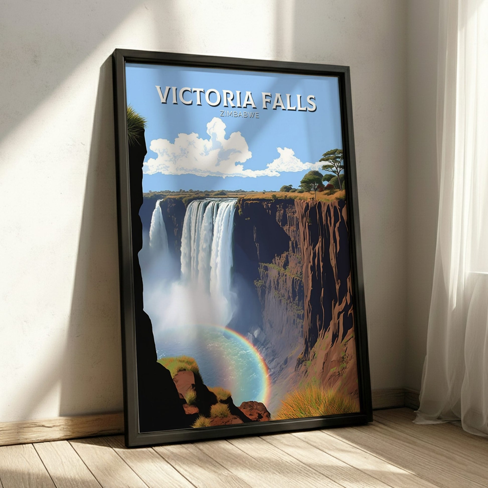 Framed poster of Victoria Falls with a rainbow, displayed on a wall.