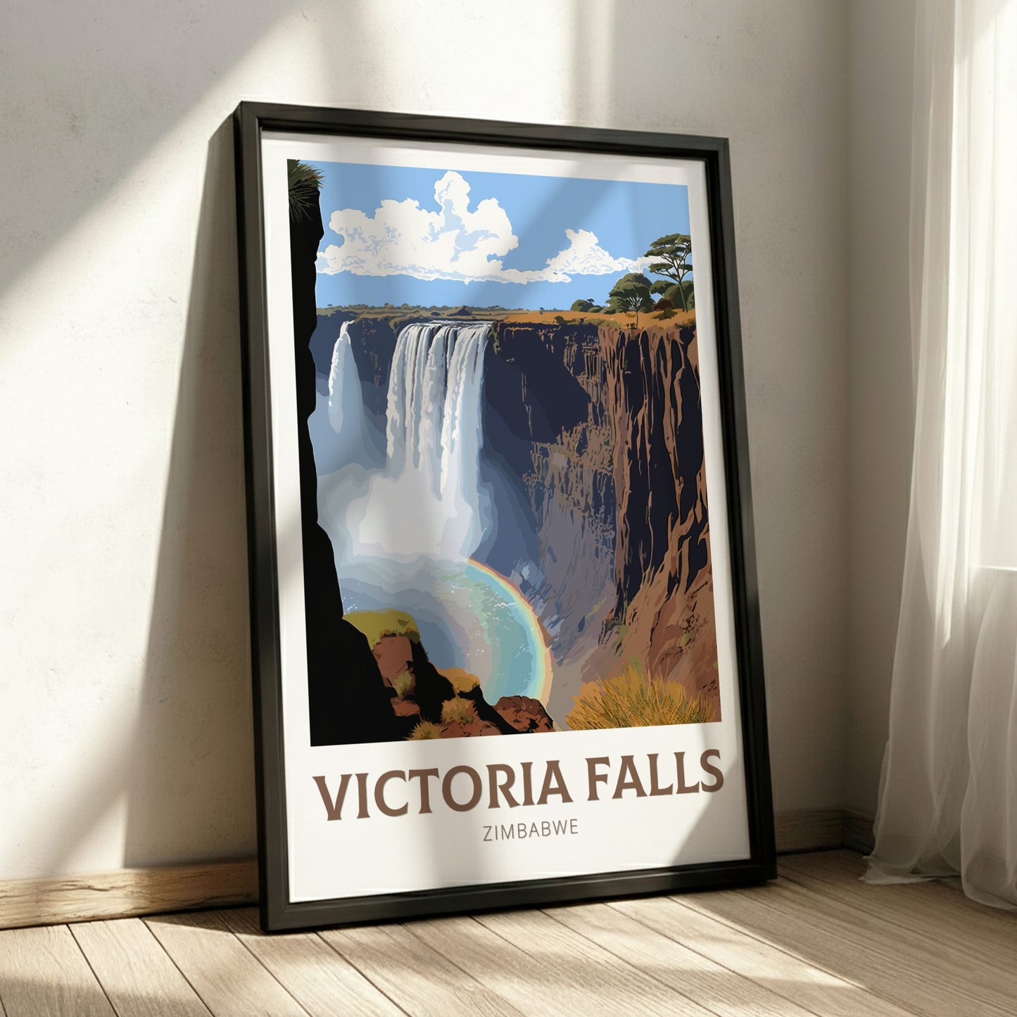 Framed poster of Victoria Falls, Zimbabwe on a wall.