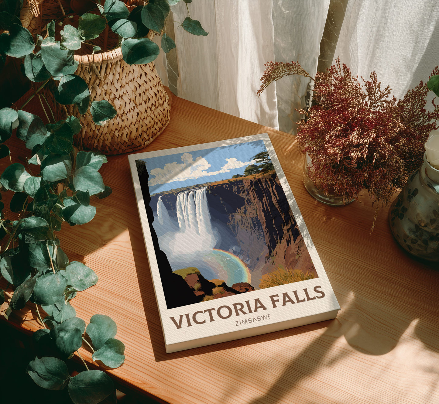 Canvas 'Victoria Falls' on a wooden surface with plants around