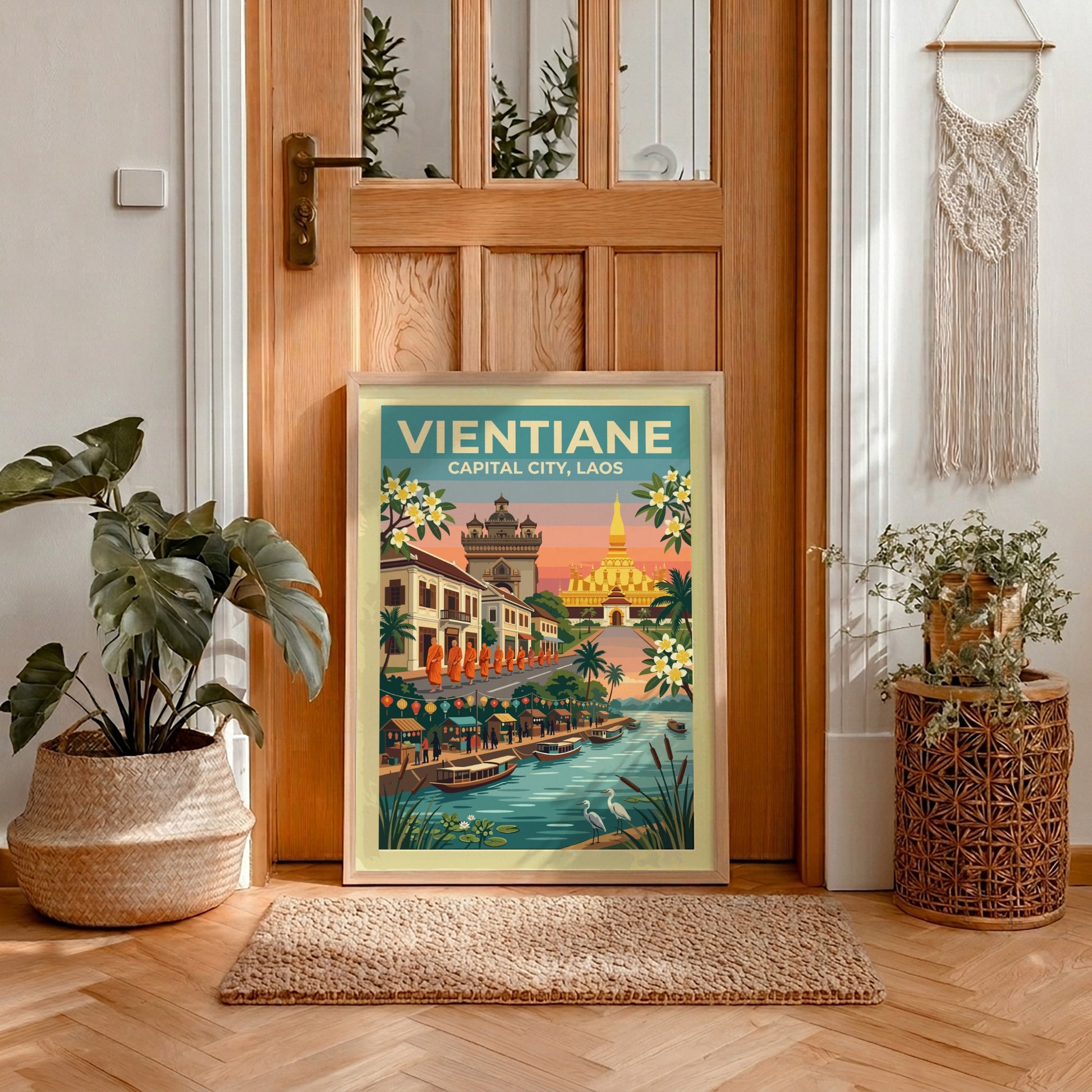 Travel poster of Vientiane Laos featuring golden stupas monks and boats at sunset