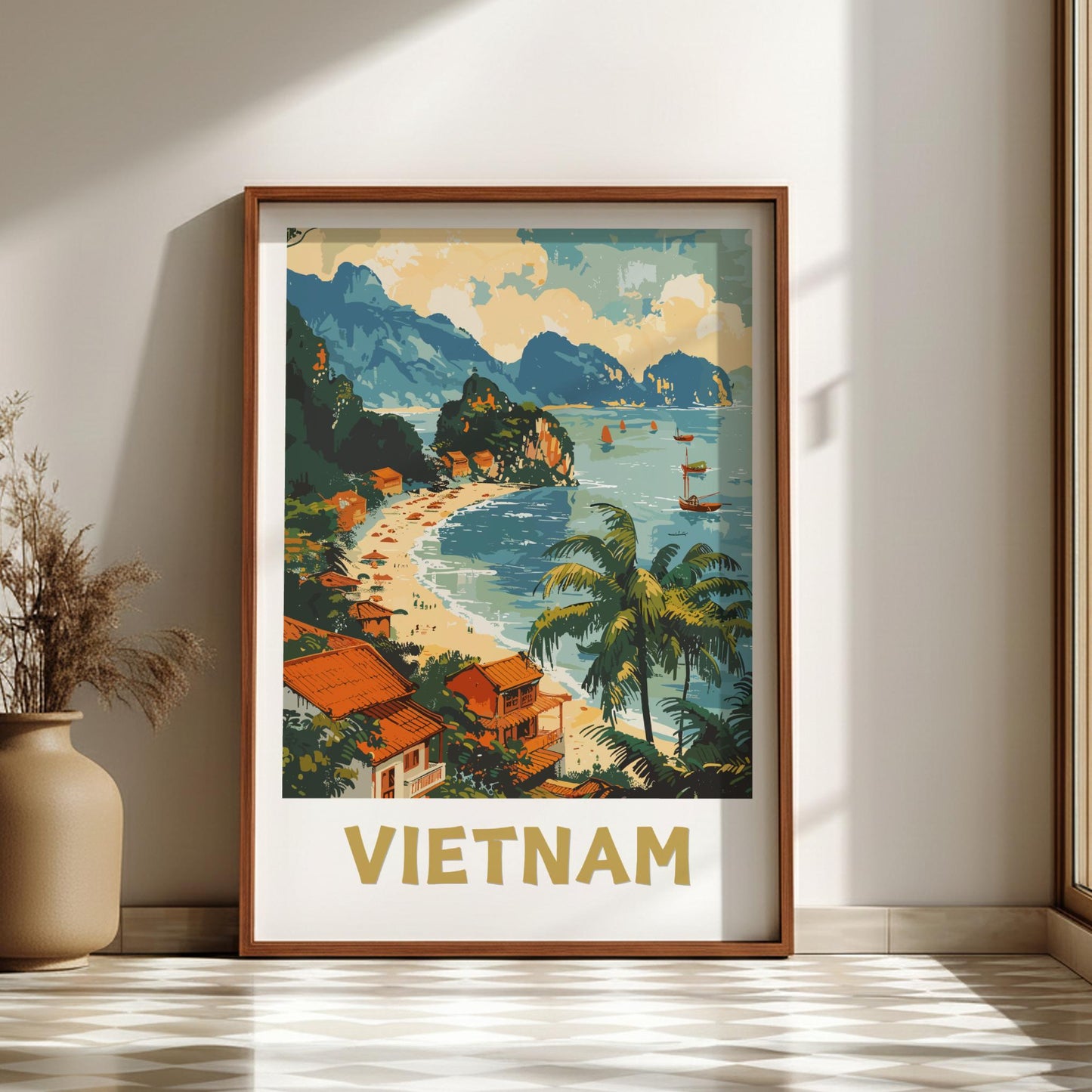 Framed poster of Vietnam with a scenic beach and mountains on a wall.
