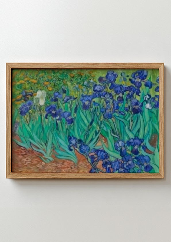 Vincent Van Gogh's Irises poster showcasing vibrant blue flowers and lush greenery, perfect for floral wall