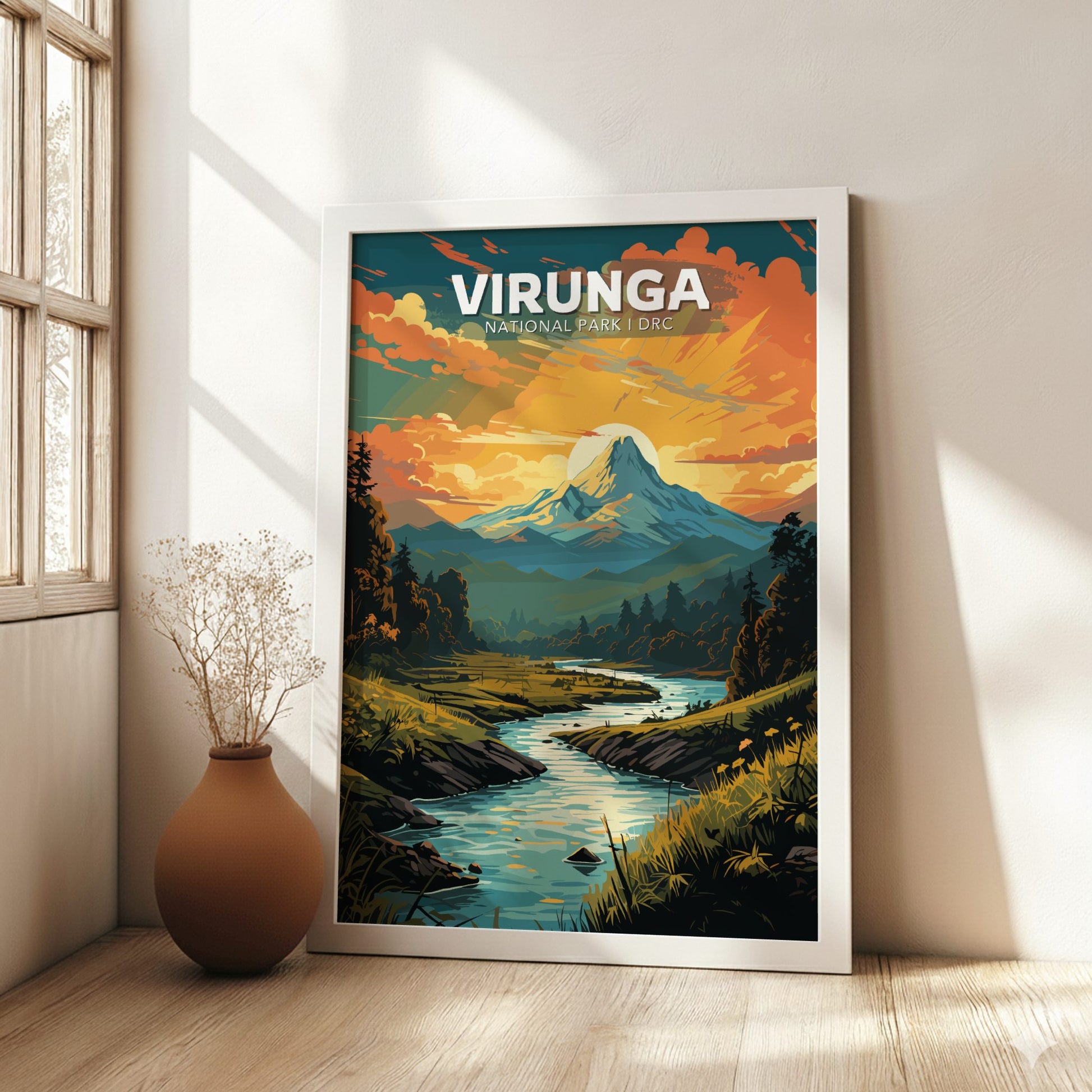 Framed poster of Virunga National Park with a scenic landscape on a wall.