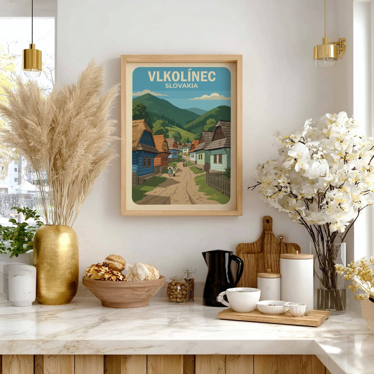 Poster featuring colourful timber houses in Vlkolinec Slovakia with rolling green mountains behind