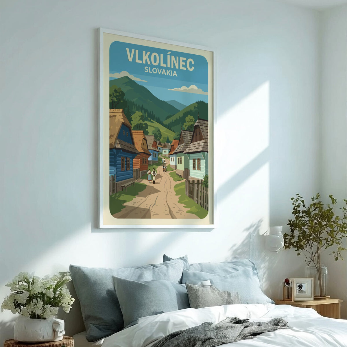 Poster featuring colourful timber houses in Vlkolinec Slovakia with rolling green mountains behind