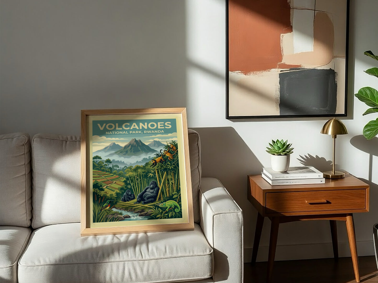 Travel poster of Volcanoes National Park Rwanda featuring mountain gorillas and golden monkeys below