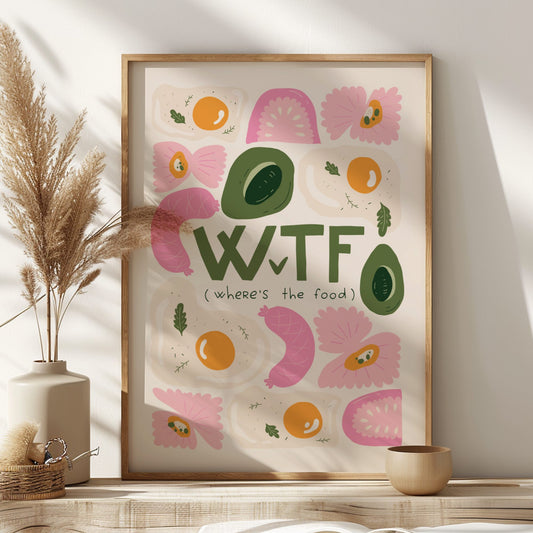 Framed artwork with colorful fruit illustrations and 'WTF' text on a wall.