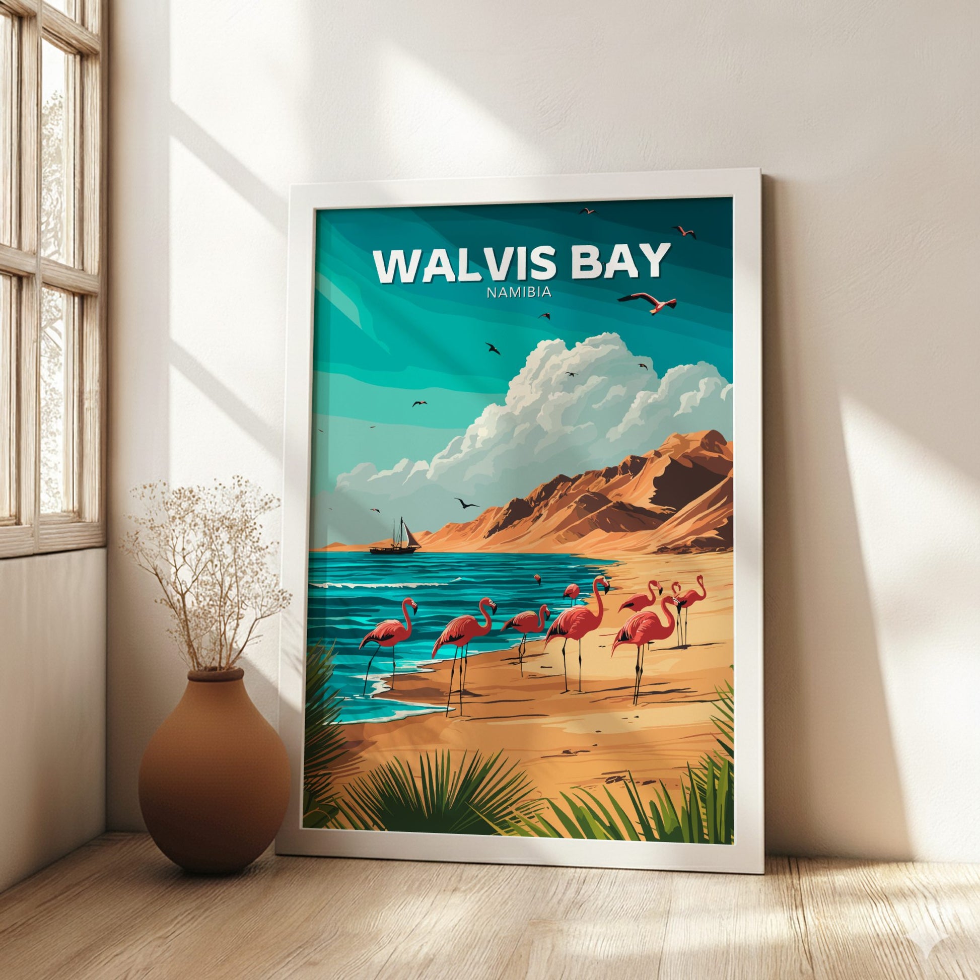 Framed artwork of Walvis Bay, Namibia with flamingos on a beach.