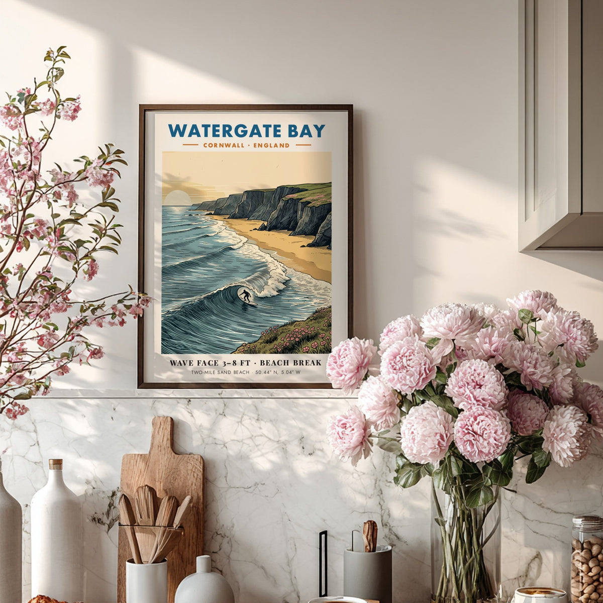 Poster of Watergate Bay Cornwall featuring a surfer on waves near dramatic cliffs.