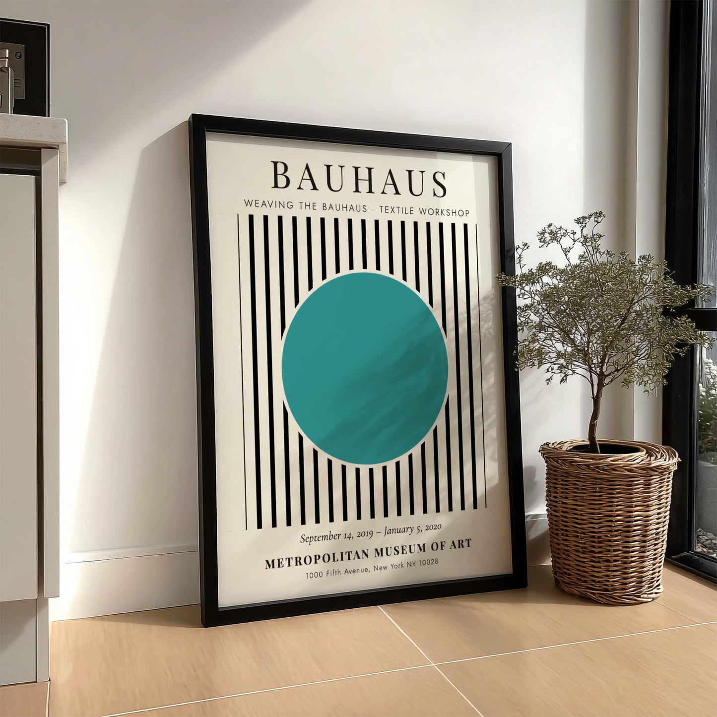 Bauhaus poster featuring textile design with turquoise circle and black and white stripes