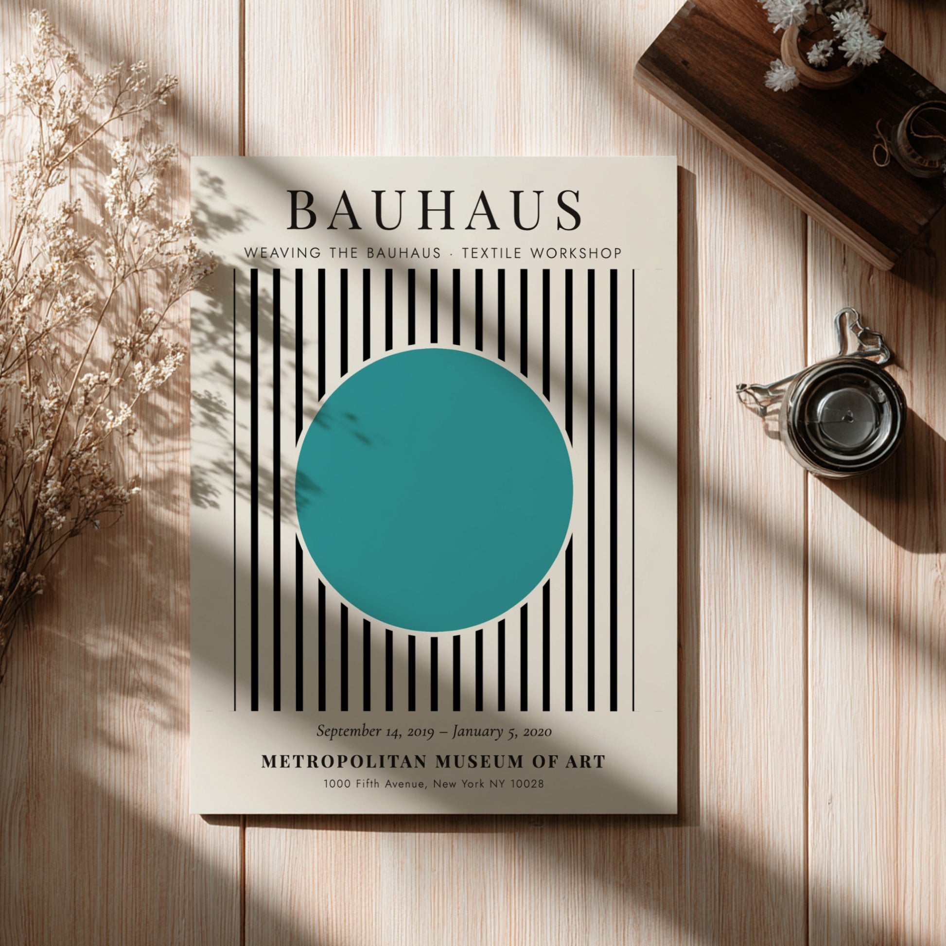 Bauhaus poster featuring textile design with turquoise circle and black and white stripes