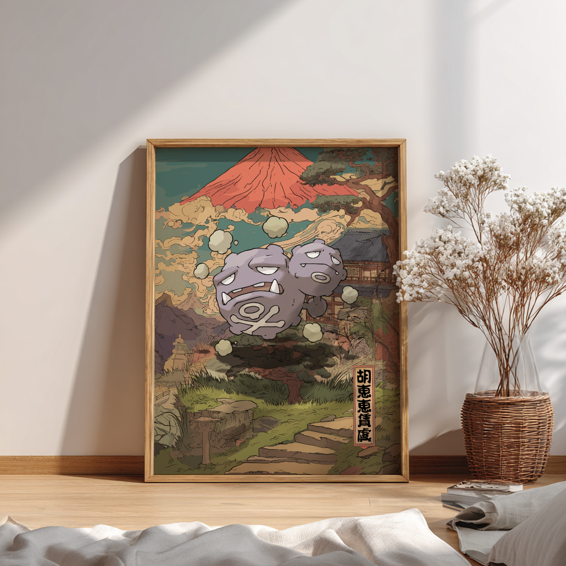 Framed artwork with Weezing Pokemon design of a mountain and traditional elements on a wall.