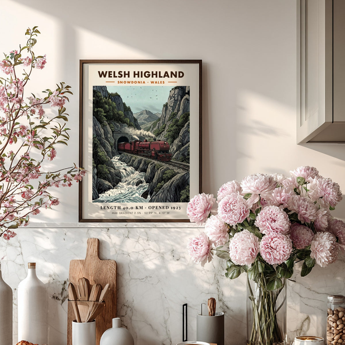 Poster featuring a red steam train passing through a mountain tunnel in Snowdonia