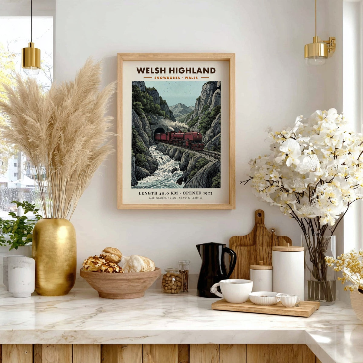 Poster featuring a red steam train passing through a mountain tunnel in Snowdonia