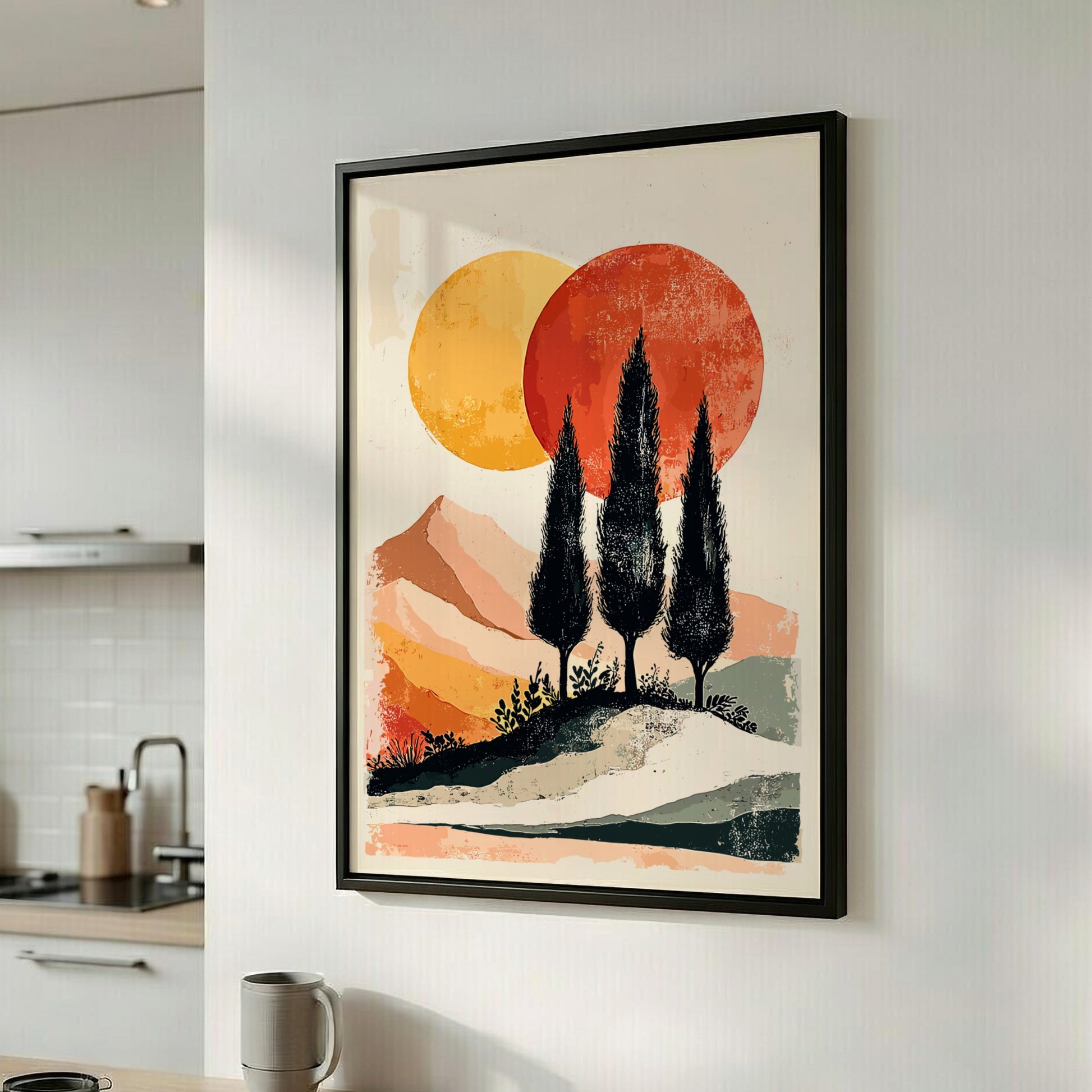 Framed artwork of a sunset with trees in a modern kitchen.
