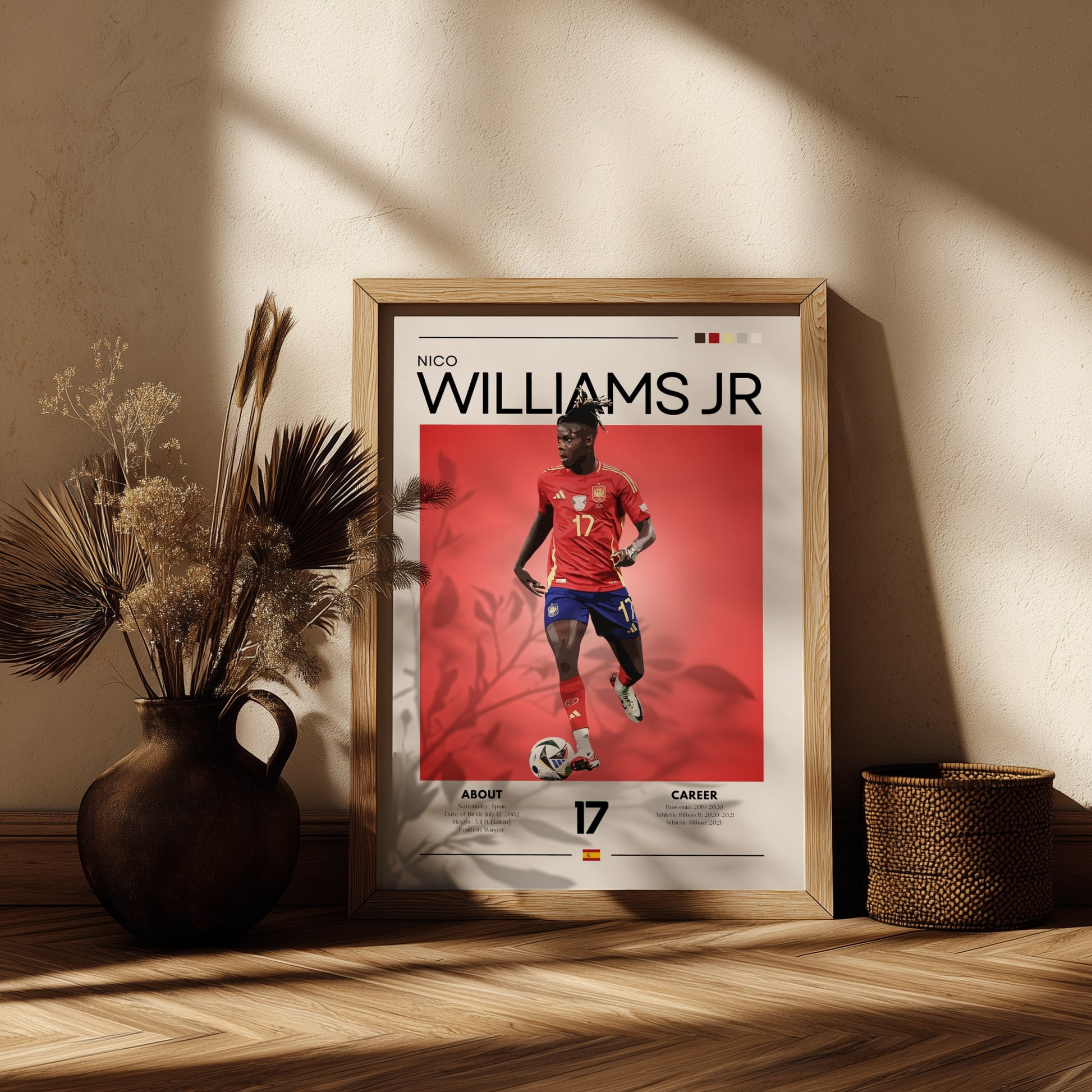 Framed sports poster of a player named Williams Jr. on a wooden shelf with decorative plants.