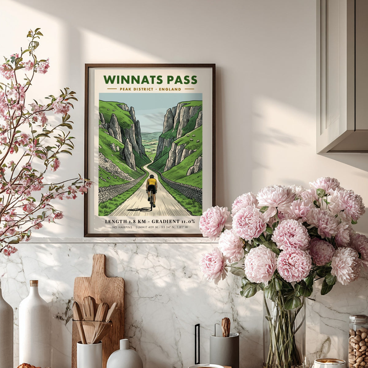 Poster of a cyclist climbing the steep winding road through Winnats Pass cliffs