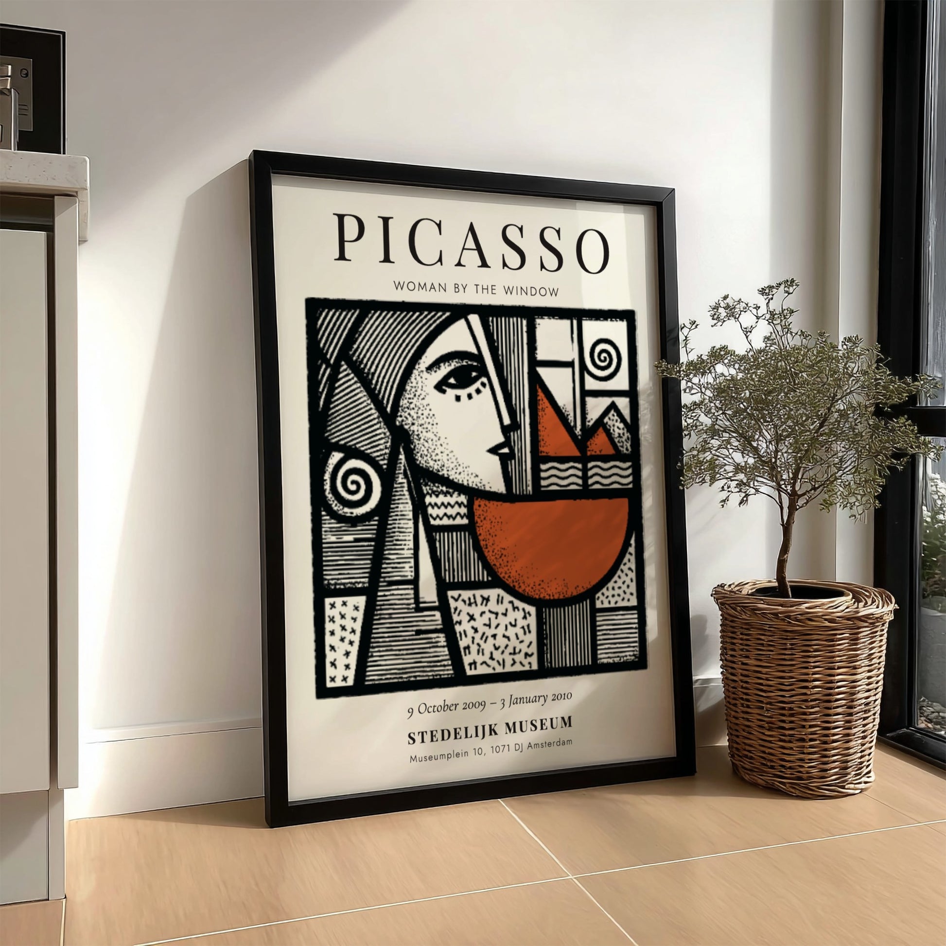 Picasso inspired poster featuring woman by the window with bold lines and earthy tones