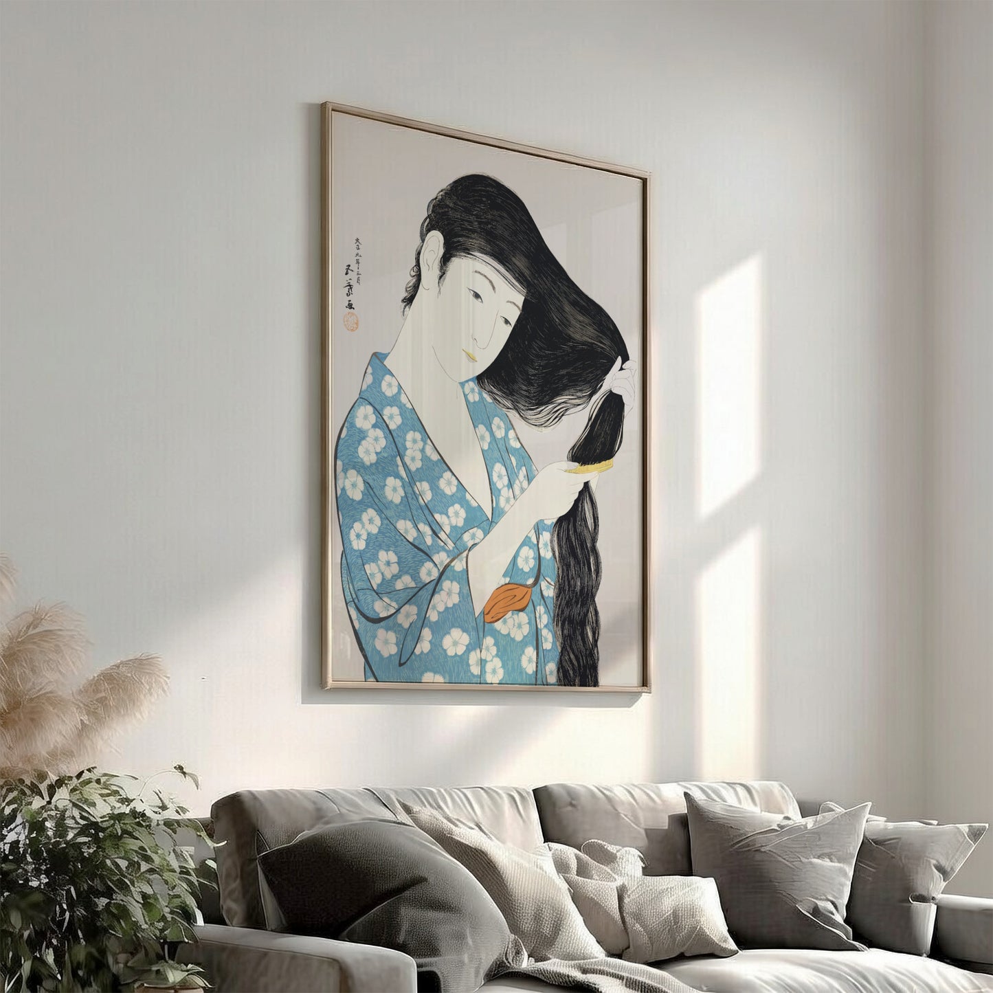 Poster of "Woman Combing Her Hair" by Goyō Hashiguchi, featuring a woman in a blue floral kimono brushing