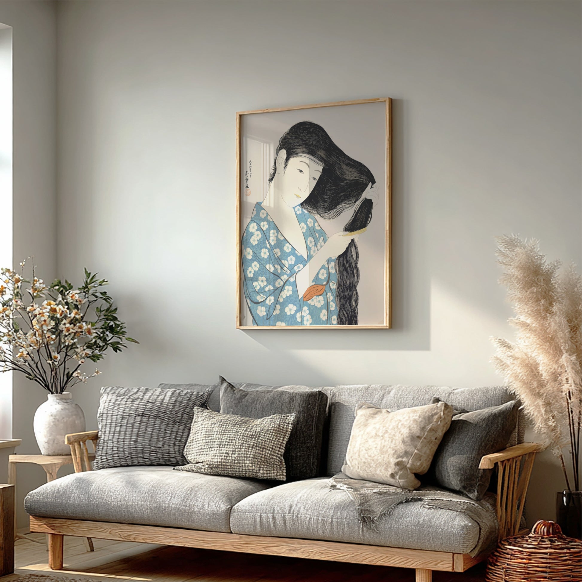 Poster of "Woman Combing Her Hair" by Goyō Hashiguchi, featuring a woman in a blue floral kimono brushing