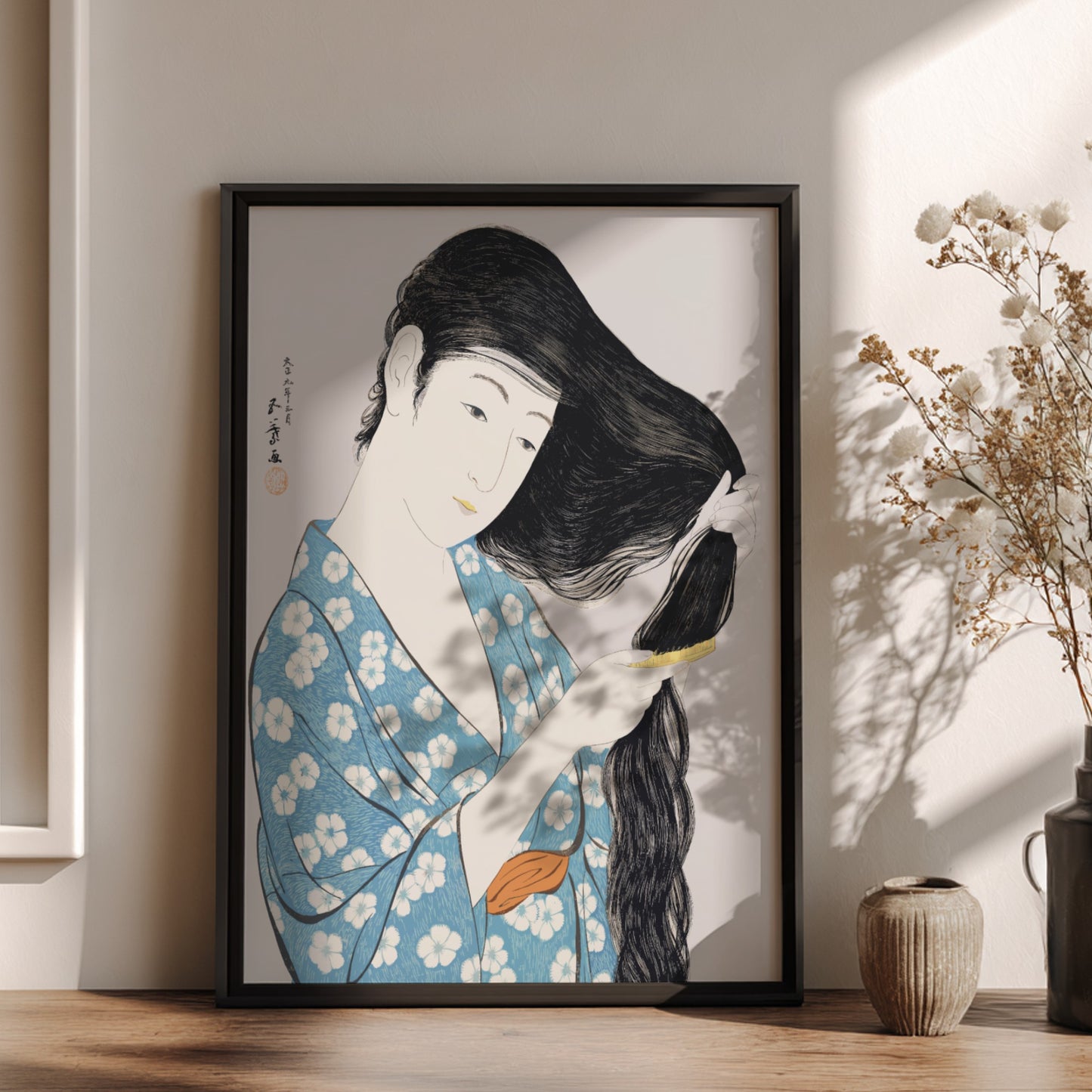 Poster of "Woman Combing Her Hair" by Goyō Hashiguchi, featuring a woman in a blue floral kimono brushing