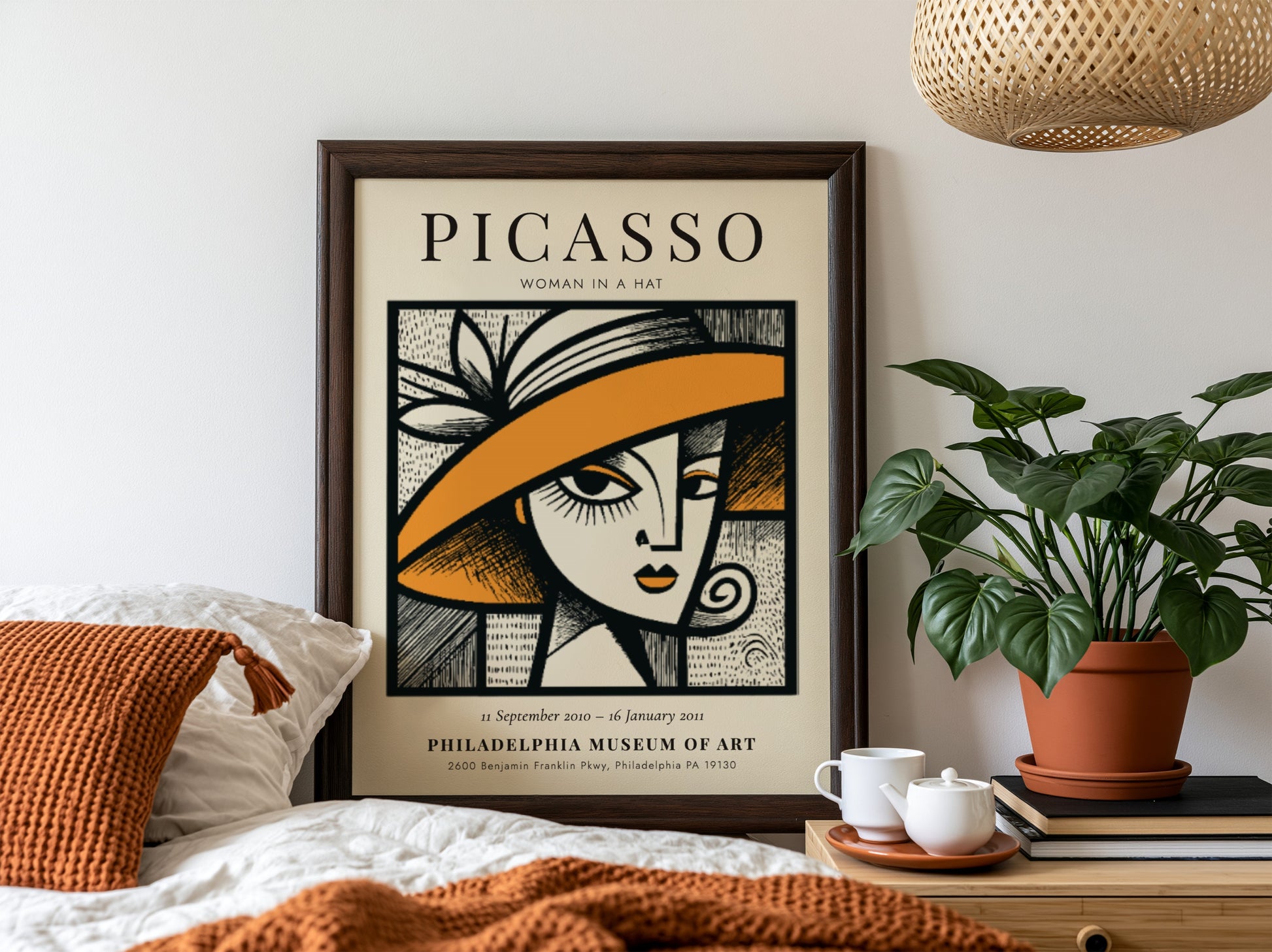 Woman in a Hat poster featuring bold lines and vibrant colors inspired by Picasso's style