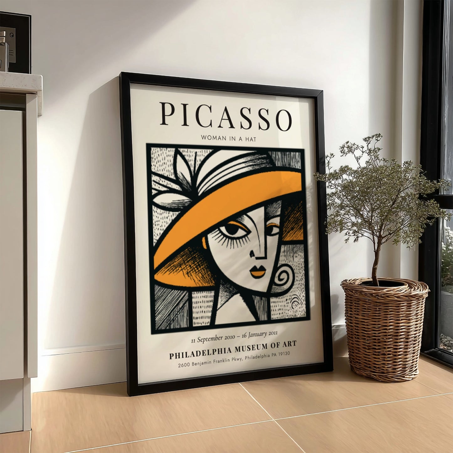 Woman in a Hat poster featuring bold lines and vibrant colors inspired by Picasso's style
